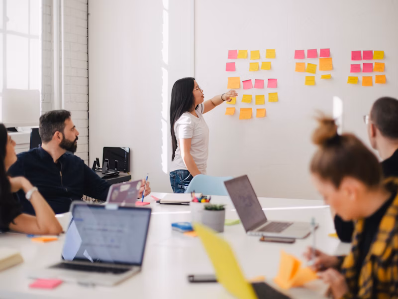 Professional business team collaborating in modern office space